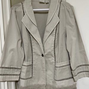 This is a lightweight chico size 1 tan jacket .. it was barely worn